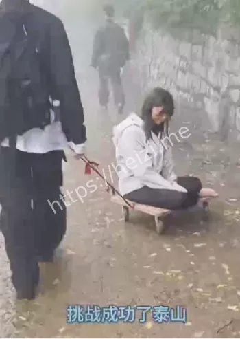 青岛00后徒手挑战泰山成功